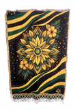 Jamaica Tapestry Blanket — Jacquard woven cotton throw in black green and gold with a botanical mandala, hibiscus flowers, tropical leaves, scattered stars and diagonal stripes, finished with fringe